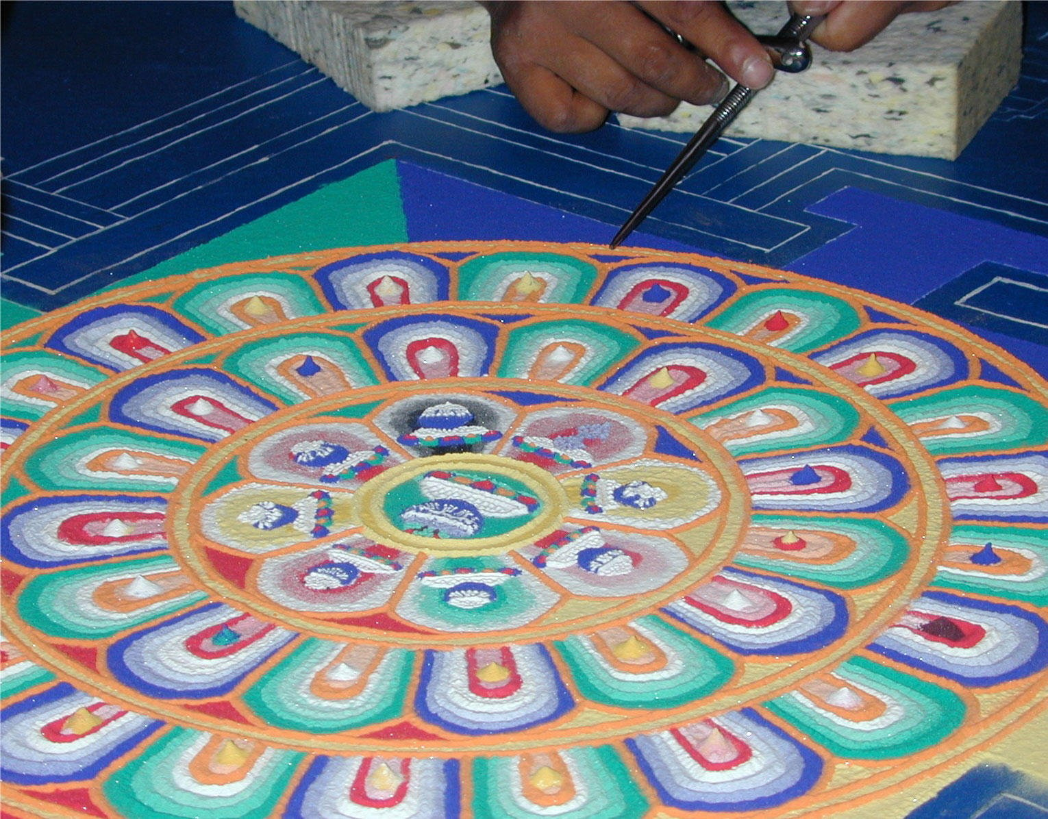 Foto mandala di sabbia